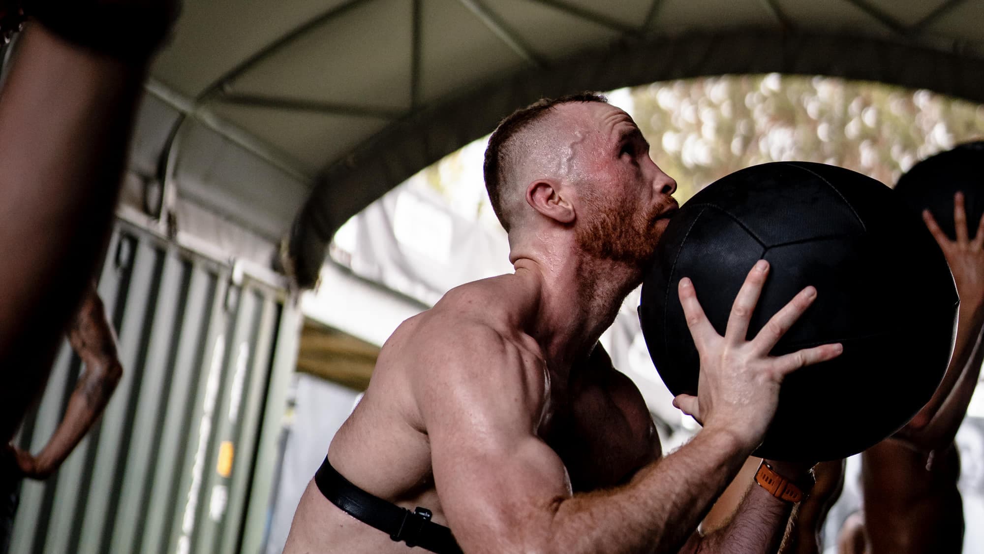 Ben Sutherland catching a wall ball at the bottom of the squat