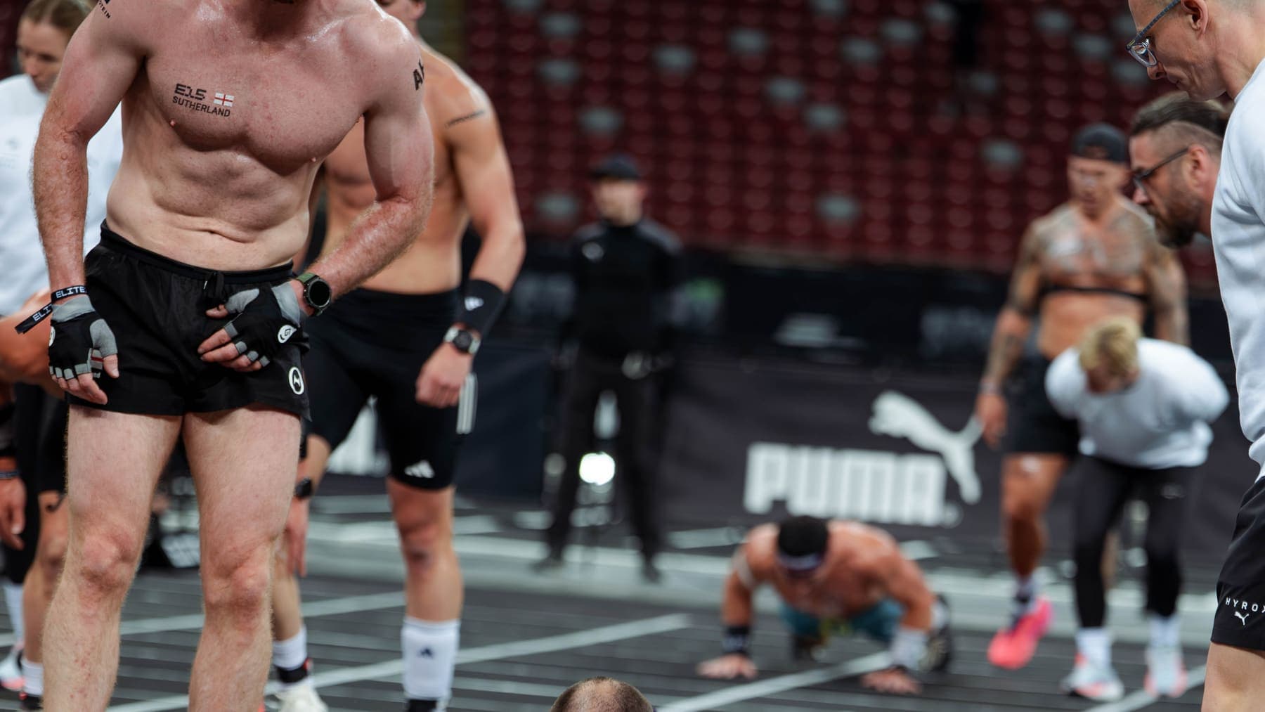 An elite athlete mid burpee broad jump