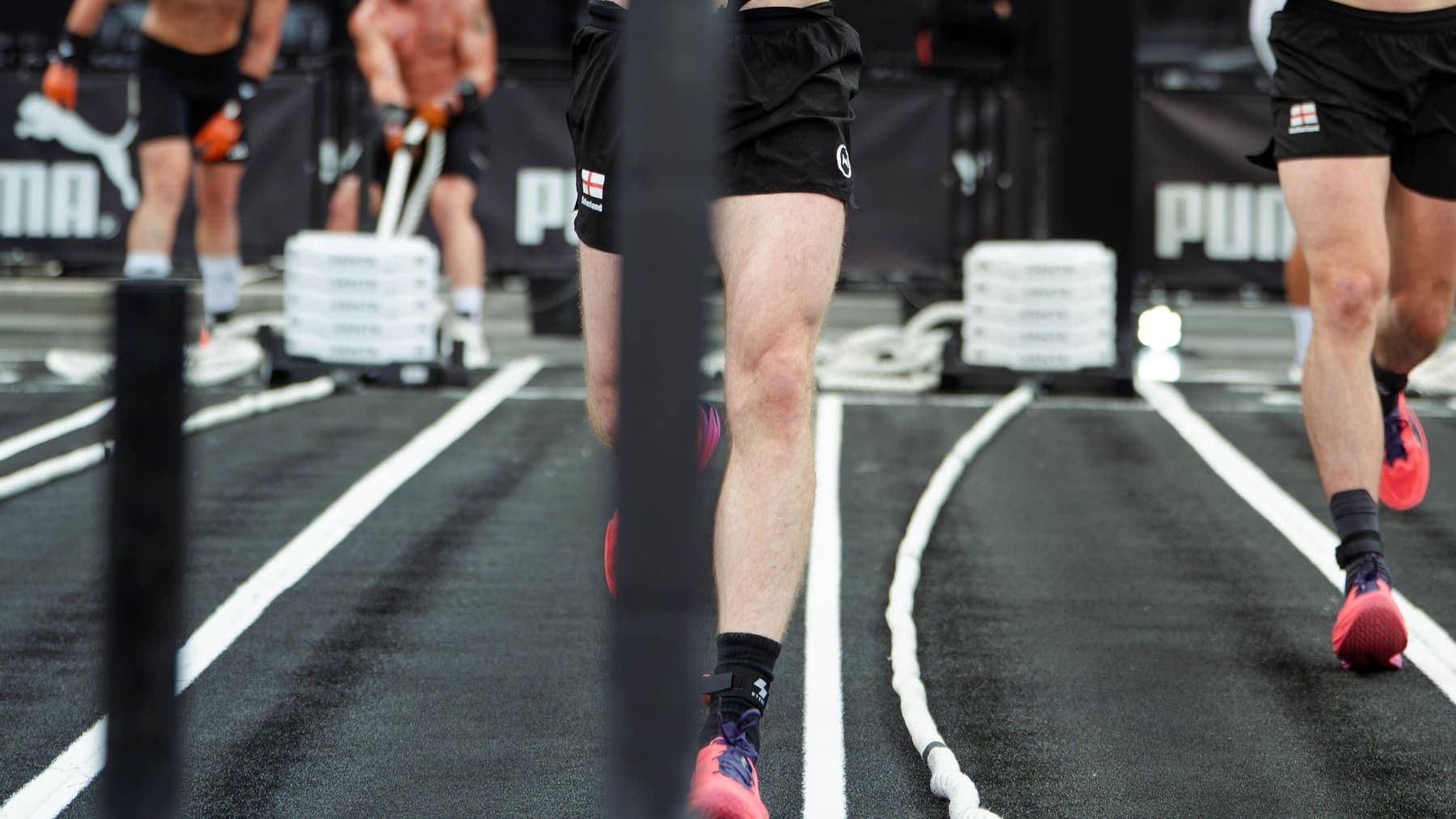 An athlete running head on at race pace
