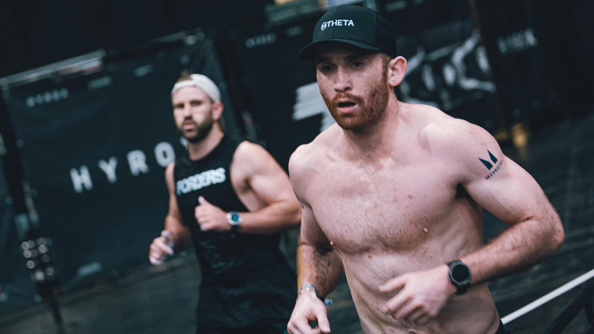 Ben Sutherland running an arena lap between stations