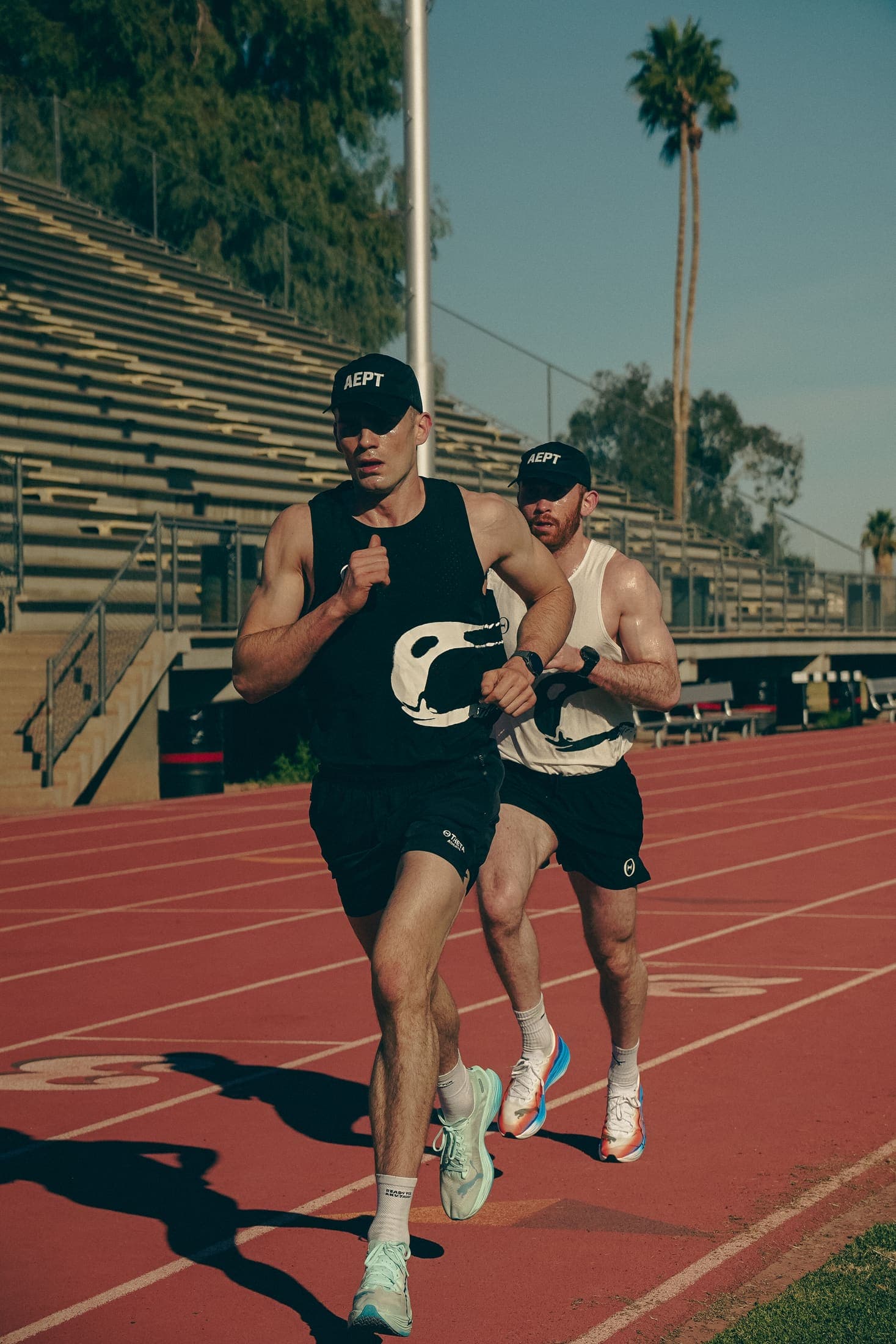 Two athletes preparing for a session