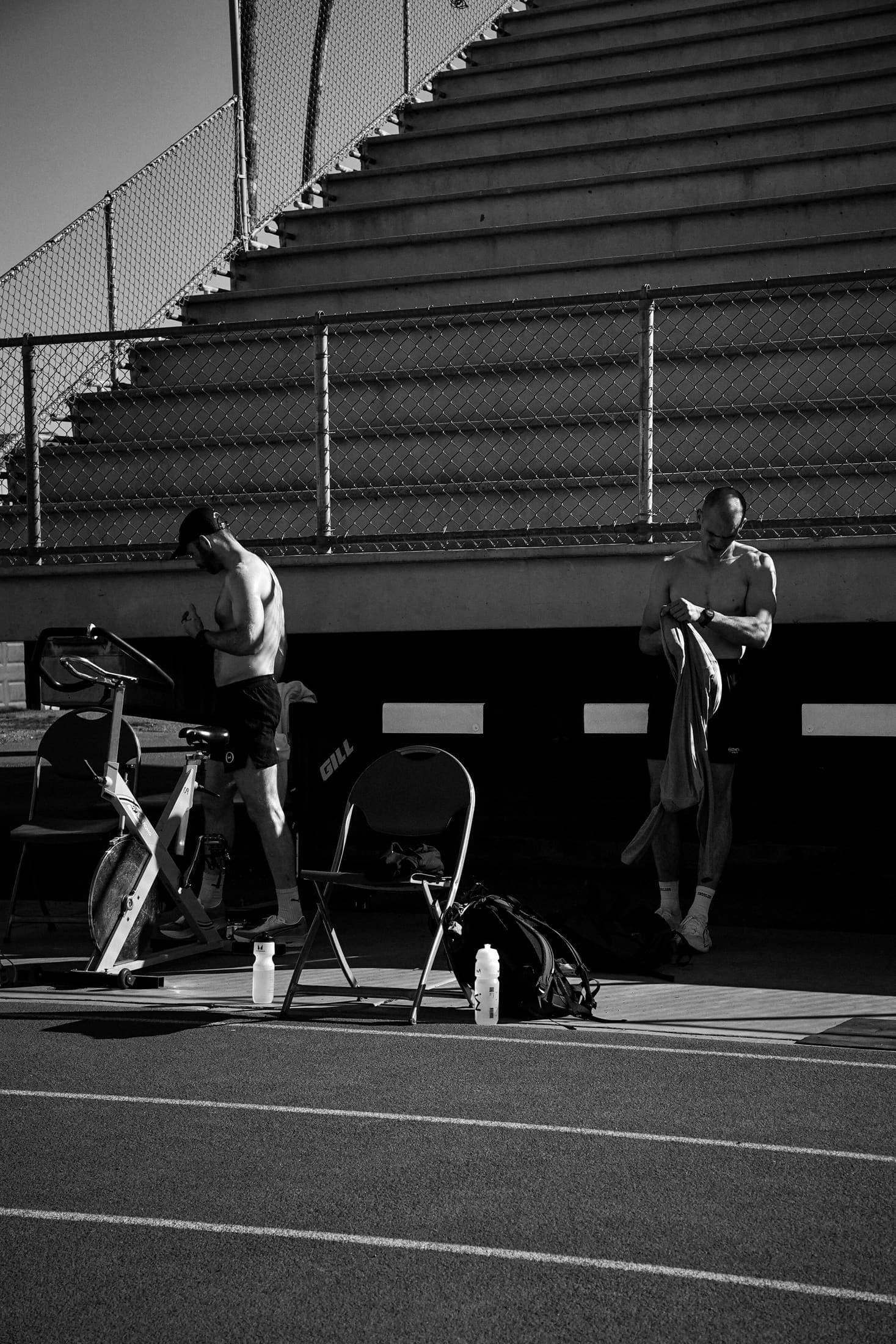 Training kit and bike erg set up under the stadium stands.